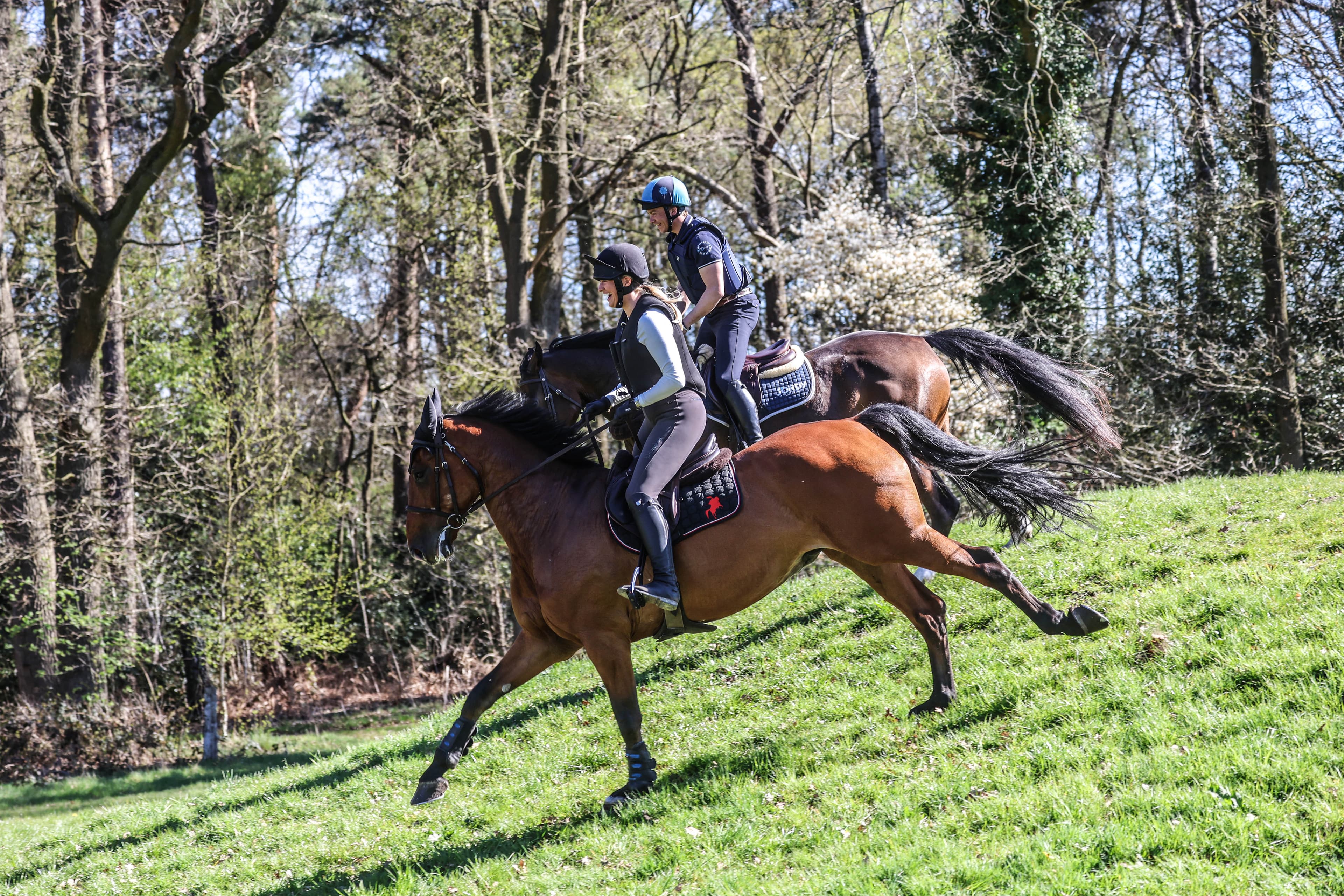 Riders galloping across the cross-country course at Military Boekelo